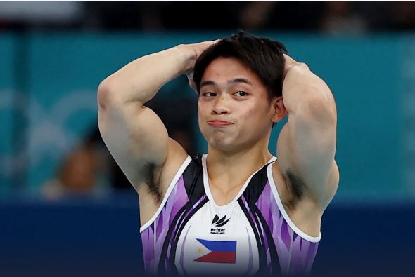 Nhà vô địch Olympic Carlos Yulo rút lui khỏi SEA Games 33- Ảnh 1. Nhà vô địch Olympic Carlos Yulo rút lui khỏi SEA Games 33- Ảnh 1.