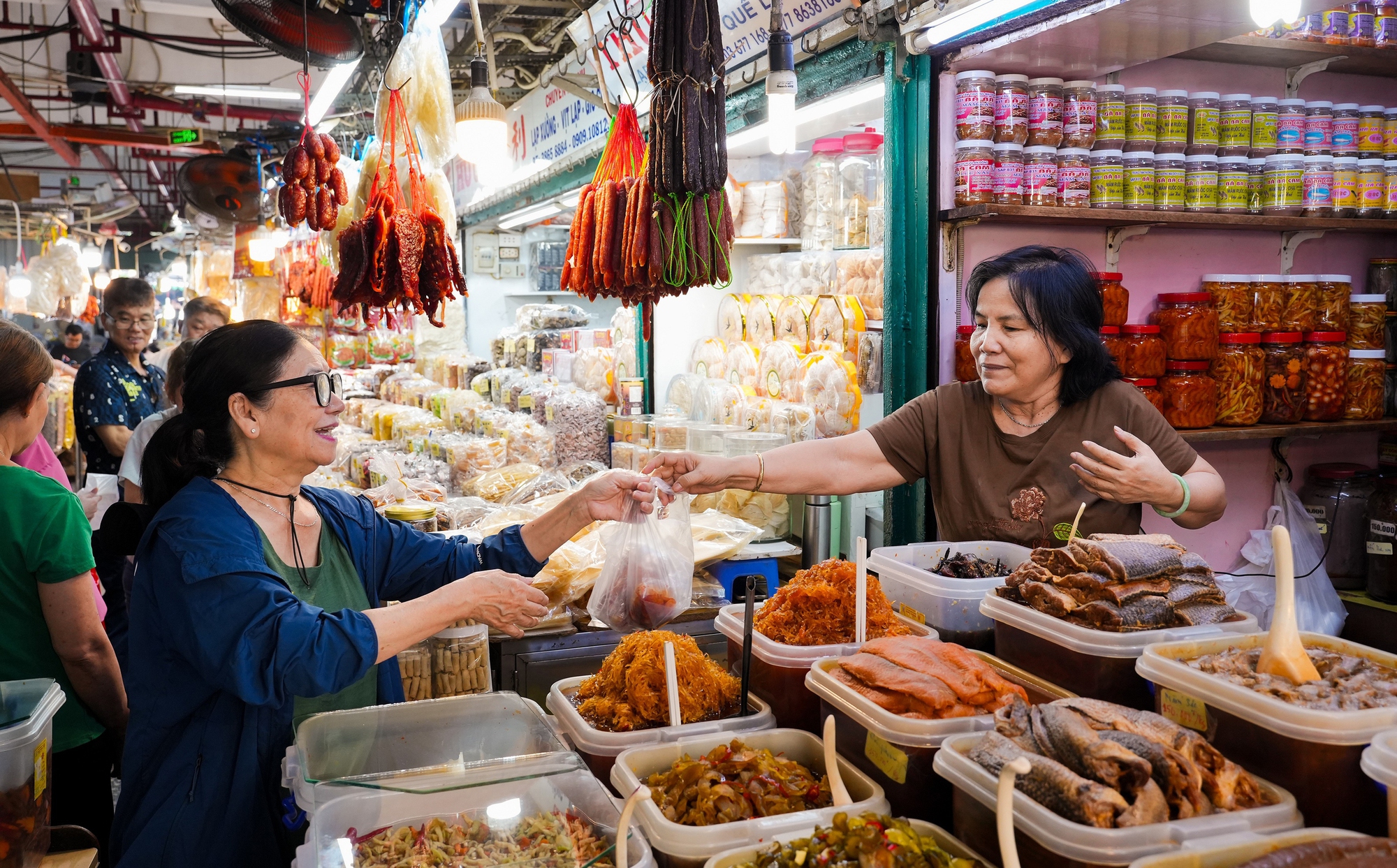 Thiếu hướng dẫn, hộ kinh doanh lo ngưỡng tính thuế - Ảnh 1. hộ kinh doanh - Ảnh 1.