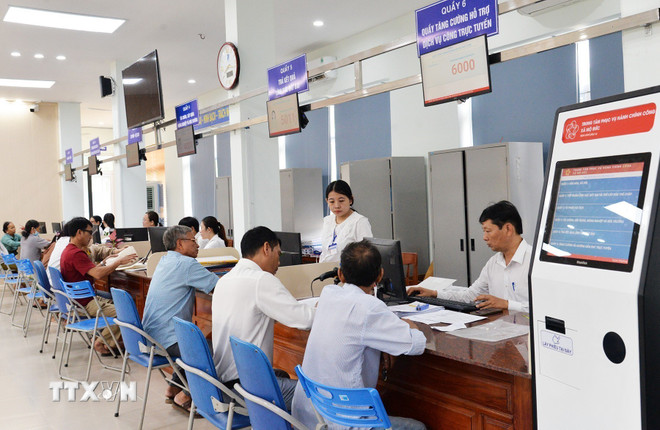 Tinh gọn bộ máy: Gần dân và hiệu quả hơn - Ảnh 2.