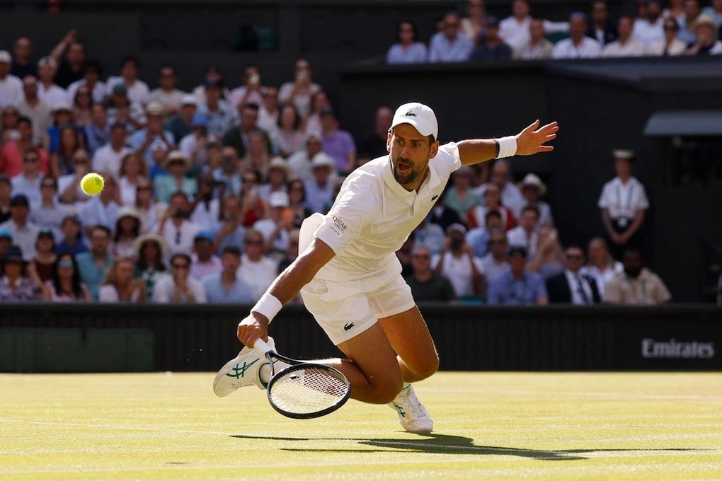 Giành chiến thắng vòng 3, Nole chạm đến kỷ lục của Federer- Ảnh 1.