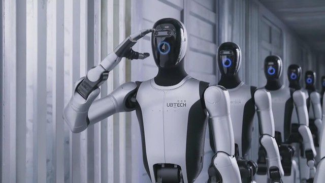 Hàng trăm robot hình người đồng loạt “hành quân” vào nhà máy Trung Quốc- Ảnh 2. Hàng trăm robot hình người đồng loạt “hành quân” vào nhà máy Trung Quốc- Ảnh 2.