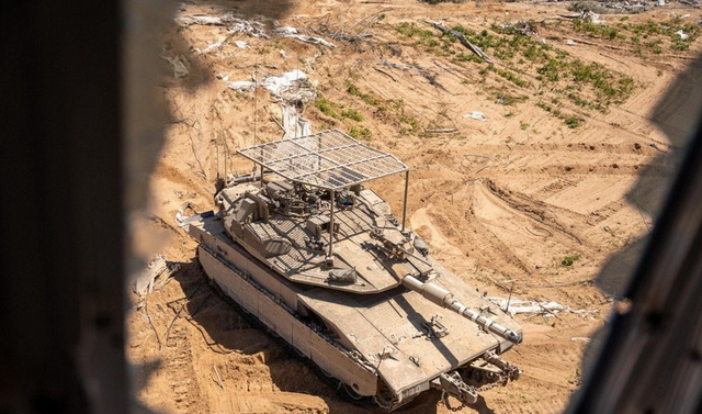 Đức dỡ bỏ hạn chế xuất khẩu vũ khí sang Israel - Ảnh 1.