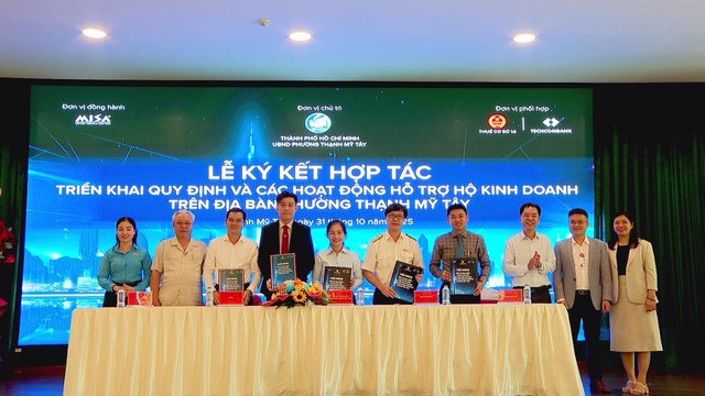 UBND phường Thạnh Mỹ Tây ký kết hợp tác nhiều nơi để hỗ trợ hộ kinh doanh trong khu vực lân cận - Ảnh 2.