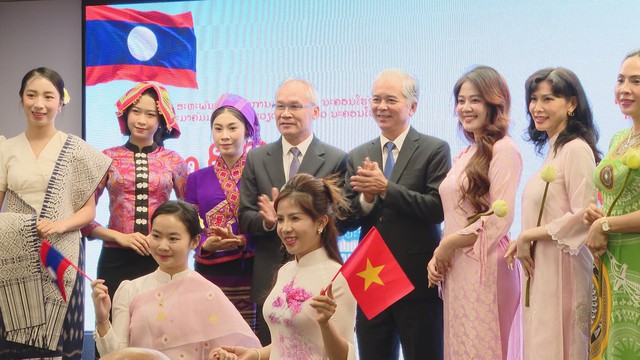 TP.HCM kỷ niệm 50 năm Quốc khánh Lào, thắt chặt tình hữu nghị đặc biệt Việt Nam – Lào - Ảnh 4.