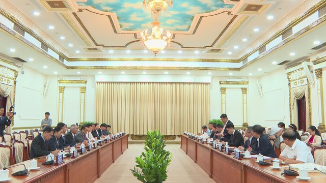 TP.HCM tăng cường hợp tác với Kiểm toán Nhà nước Lào - Ảnh 1.