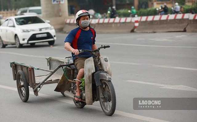 Xe máy tại Hà Nội và TPHCM sẽ phải kiểm định khí thải từ 1/7/2027 theo đề xuất mới - Ảnh 1.