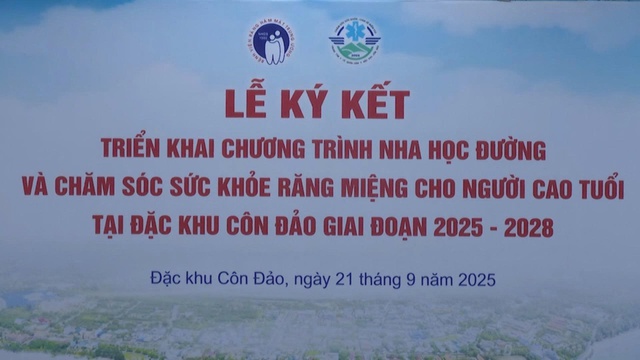 Lễ ký kết chương trình nha học đường tại Côn Đảo - Ảnh 1.