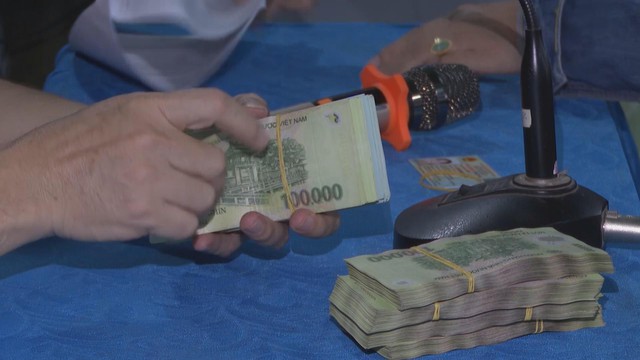 Phú Giáo: Người dân phấn khởi nhận tiền mừng lễ Quốc khánh 2/9 - Ảnh 8.