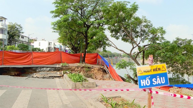 Khẩn trương xử lý sự cố sụp lún nghiêm trọng trên đường Ba Đình, TP. Hồ Chí Minh - Ảnh 2.
