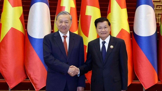Tổng Bí thư, Chủ tịch nước Lào thăm cấp Nhà nước tới Việt Nam - Ảnh 1.