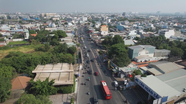 60 Giây ngày 27/1/2026 | Dự án mở rộng Quốc lộ 13 phía Bắc TP. Hồ Chí Minh: Nhiều đoạn đường đã hoàn thiện - Ảnh 2.