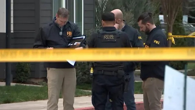 Biểu tình phản đối 2 vụ nổ súng của các nhân viên liên bang Mỹ - Ảnh 1.