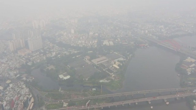 60 Giây ngày 11/2/2026 | Mưa trái mùa kèm mù khô xuất hiện cận Tết tại TP. Hồ Chí Minh - Ảnh 1.