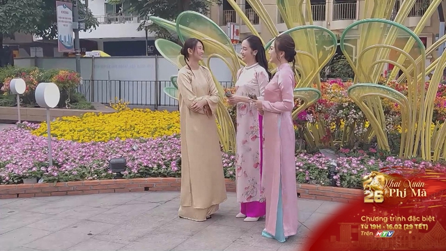 Rực rỡ áo dài Việt trước thềm khai mạc Đường hoa Nguyễn Huệ - Ảnh 2.