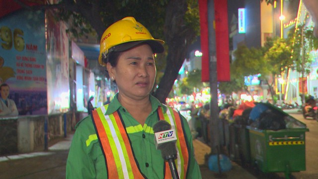 Phía sau những con đường sạch bóng ngày mùng 1 Tết - Ảnh 3.