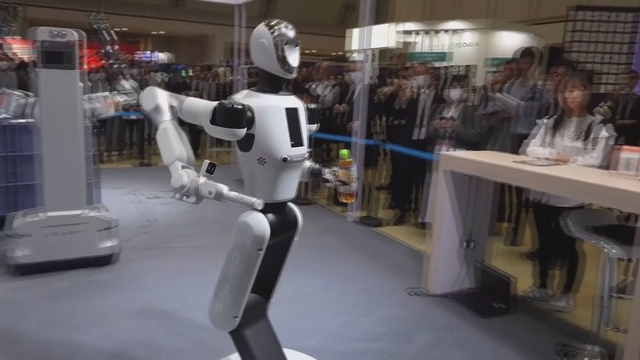 Nhật Bản: Triển lãm robot hình người ứng dụng A.I - Ảnh 1.