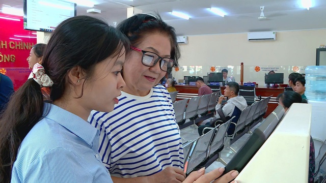 TP. Hồ Chí Minh đẩy mạnh “cánh tay ảo” hỗ trợ giải quyết thủ tục hành chính - Ảnh 2.