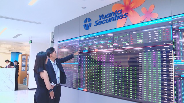 Thị trường chứng khoán bật tăng sau thông tin giữ nguyên lộ trình nâng hạng  - Ảnh 1.