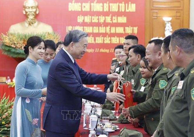 Tổng Bí thư Tô Lâm gặp mặt các tập thể, cá nhân tham gia bảo vệ an ninh, trật tự ở cơ sở tiêu biểu, xuất sắc - Ảnh 2.