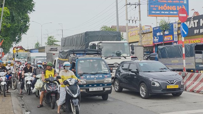 TP. Hồ Chí Minh điều chỉnh biển báo và phân làn trên tuyến đường Mỹ Phước - Tân Vạn- Ảnh 2.