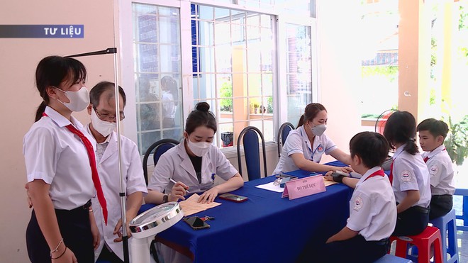 Thành phố Hồ Chí Minh chi gần 2.000 tỷ đồng để miễn phí bảo hiểm y tế: Những điều người dân cần biết - Ảnh 7.