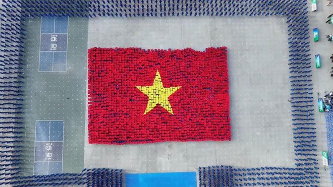 60.000 học sinh thiết lập kỷ lục Guinness Việt Nam và thế giới qua màn đồng diễn võ nhạc Vovinam - Ảnh 2.