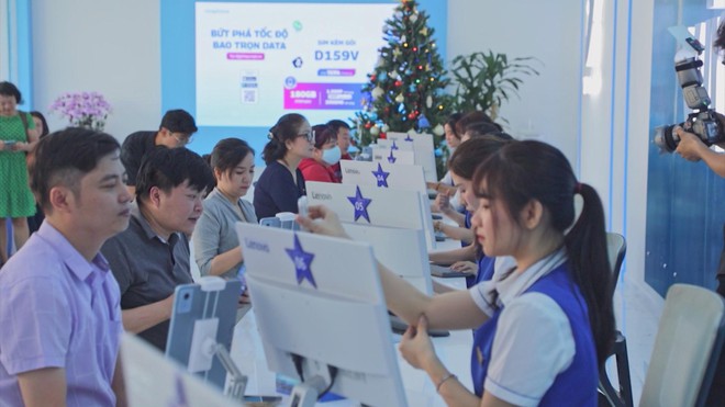 VNPT vận hành điểm giao dịch số không giấy đầu tiên tại TP. Hồ Chí Minh- Ảnh 1.