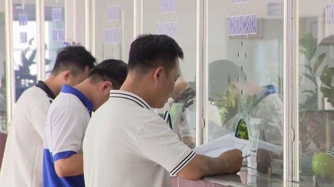 Nỗi lo của người dân, doanh nghiệp sau sáp nhập - Ảnh 2.