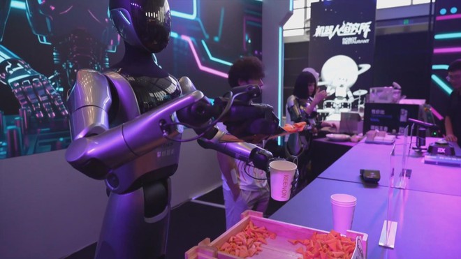 Robot hình người gây ấn tượng tại Hội nghị robot thế giới - Ảnh 2.
