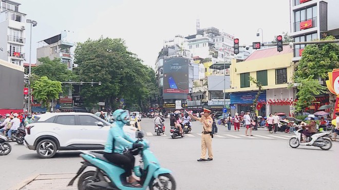 Hà Nội phân luồng giao thông phục vụ chương trình nghệ thuật chào mừng Đại hội Đảng XIV - Ảnh 1.