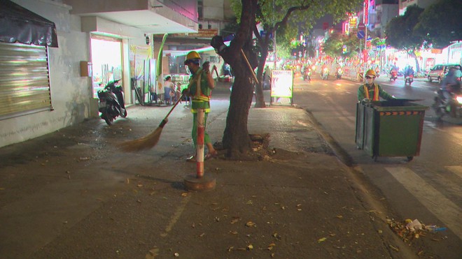 Phía sau những con đường sạch bóng ngày mùng 1 Tết - Ảnh 5.