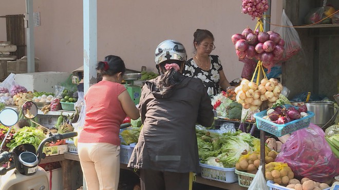 Nguồn cung ổn định, giá thực phẩm hạ nhiệt sau Tết - Ảnh 1.