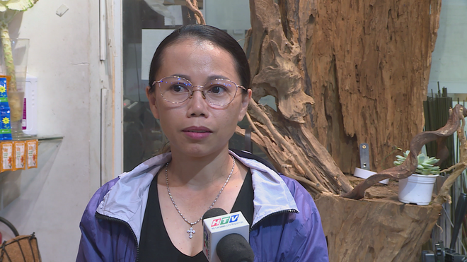 Thị trường hoa Tết TP. Hồ Chí Minh: Hoa truyền thống giữ "ngôi vương", lan hồ điệp hút khách - Ảnh 5.