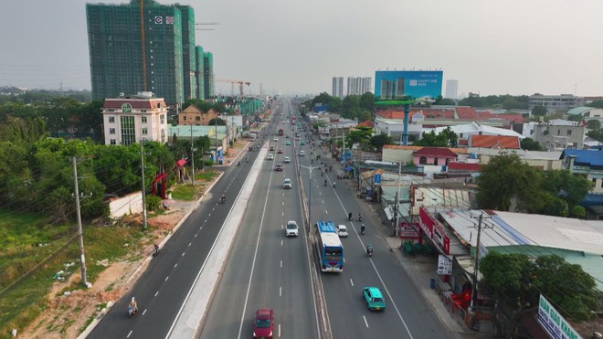 TP. Hồ Chí Minh tăng tốc hoàn thiện dự án mở rộng Quốc lộ 13 - Ảnh 1.