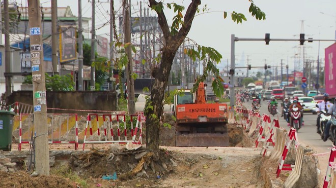 TP. Hồ Chí Minh tăng tốc hoàn thiện dự án mở rộng Quốc lộ 13 - Ảnh 2.