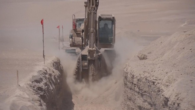 Chile: Xây dựng hệ thống rào chắn ngăn làn sóng nhập cư trái phép - Ảnh 4.