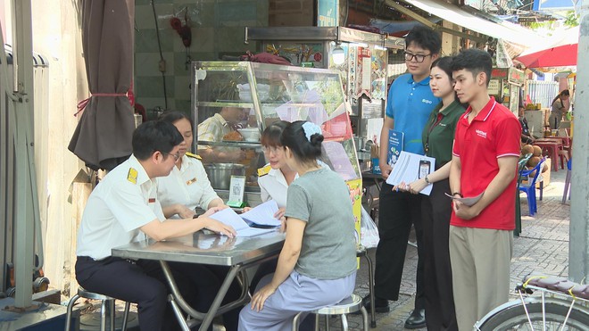 TP. Hồ Chí Minh “cầm tay chỉ việc” hộ kinh doanh trước kỳ kê khai thuế đầu tiên- Ảnh 1.