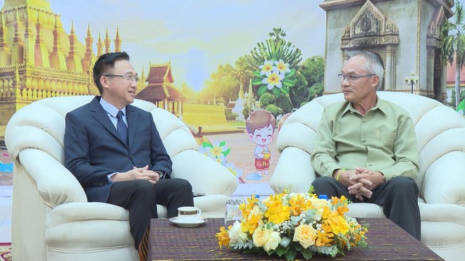 Lãnh đạo TP. Hồ Chí Minh chúc mừng Tết cổ truyền Lào- Ảnh 1.