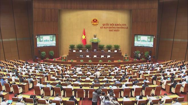 Quốc hội nghe báo cáo tại hội trường 2 dự thảo luật - Ảnh 1.