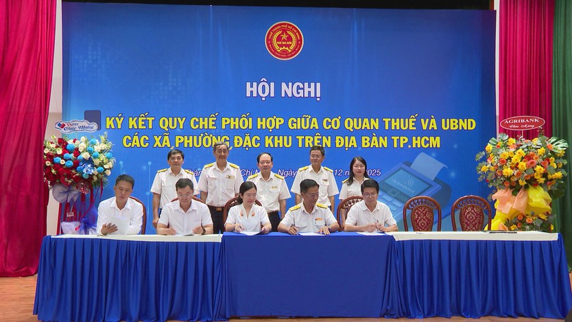 Thuế TP. Hồ Chí Minh ký kết quy chế phối hợp quản lý thuế với 168 xã, phường, đặc khu - Ảnh 1.