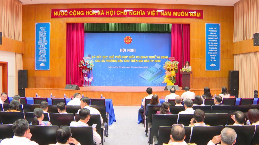 Thuế TP. Hồ Chí Minh ký kết quy chế phối hợp quản lý thuế với 168 xã, phường, đặc khu - Ảnh 2.