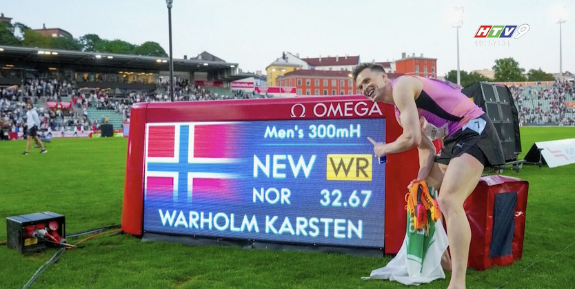 Karsten Warholm phá kỷ lục thế giới - Ảnh 1.