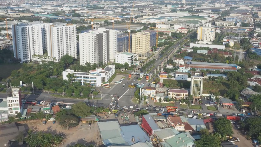 Nỗi lo của người dân, doanh nghiệp sau sáp nhập - Ảnh 1.