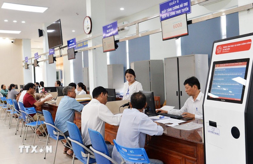 Tinh gọn bộ máy: Gần dân và hiệu quả hơn - Ảnh 2.