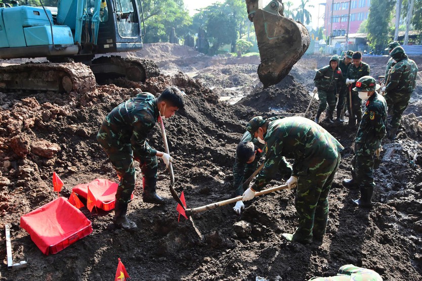 Quy tập 19 bộ hài cốt liệt sĩ trong ngày 1/10 tại Công viên Lê Thị Riêng - Ảnh 1.