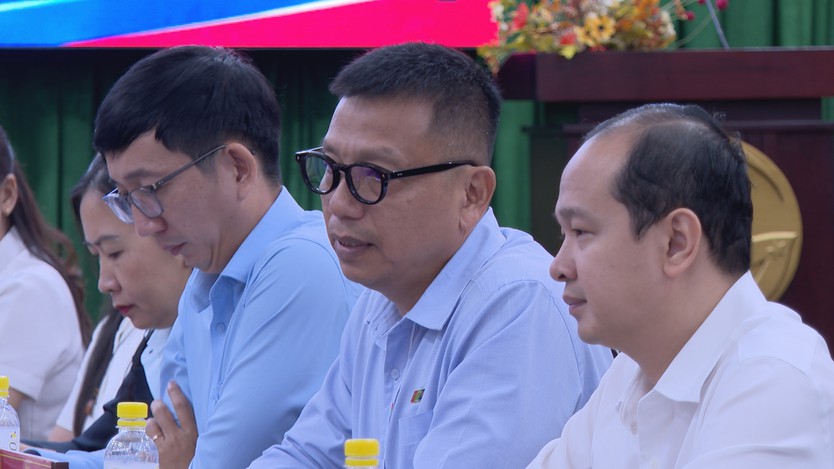 TP. Hồ Chí Minh chia sẻ kinh nghiệm chuyển đổi số báo chí với đoàn nhà báo Lào - Ảnh 4.