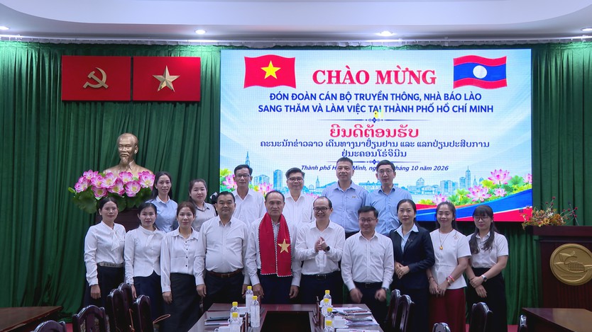 TP. Hồ Chí Minh chia sẻ kinh nghiệm chuyển đổi số báo chí với đoàn nhà báo Lào - Ảnh 6.