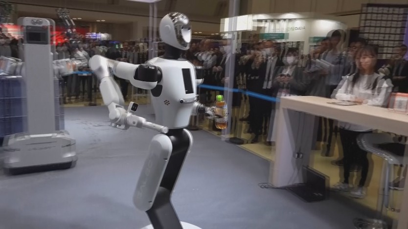 Nhật Bản: Triển lãm robot hình người ứng dụng A.I - Ảnh 1.