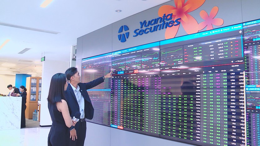 Thị trường chứng khoán bật tăng sau thông tin giữ nguyên lộ trình nâng hạng  - Ảnh 1.