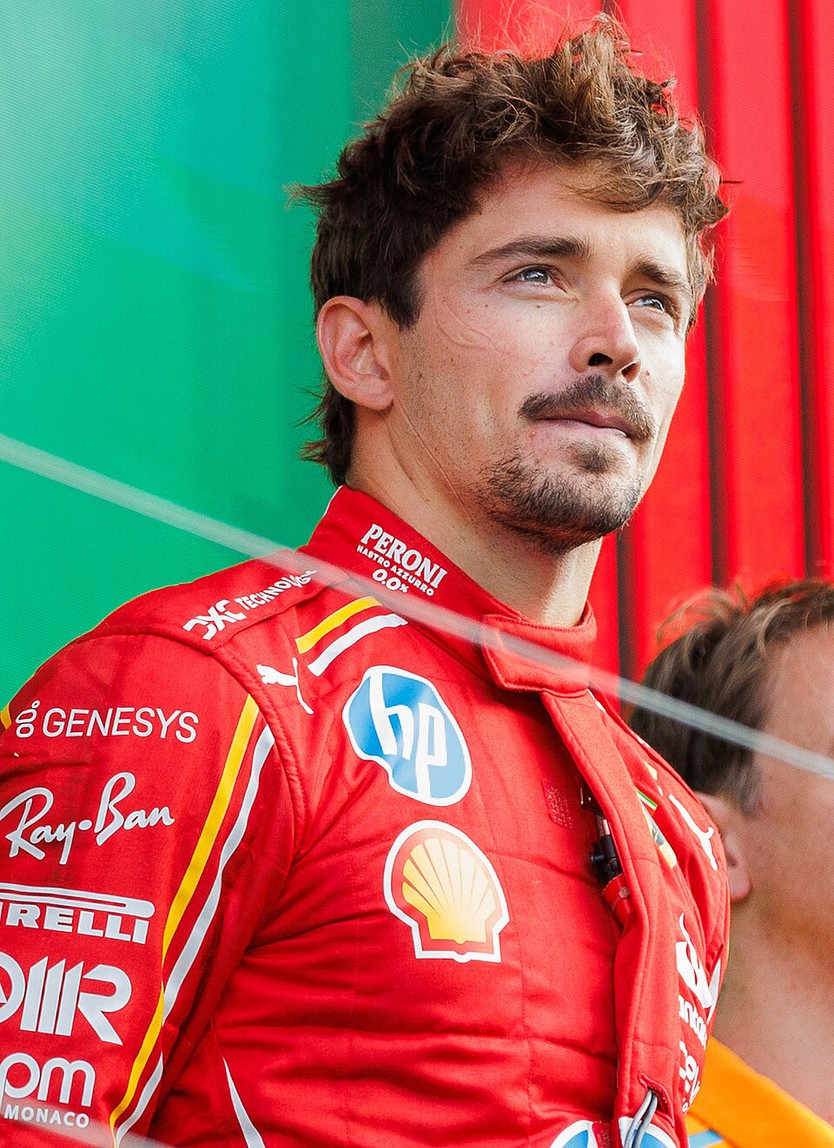 Charles Leclerc tiếp tục gắn bó với Ferrari - Ảnh 9.